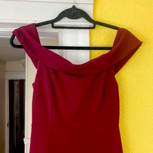 Burgundy evening gown. Classic off the shoulder. Front slit ti mud thigh.